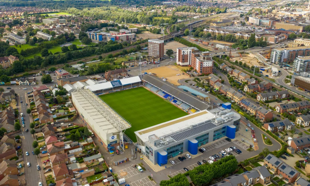 Three men have been banned from attending football matches following their involvement in disorder between fans at a game between Peterborough United and Cambridge United last year