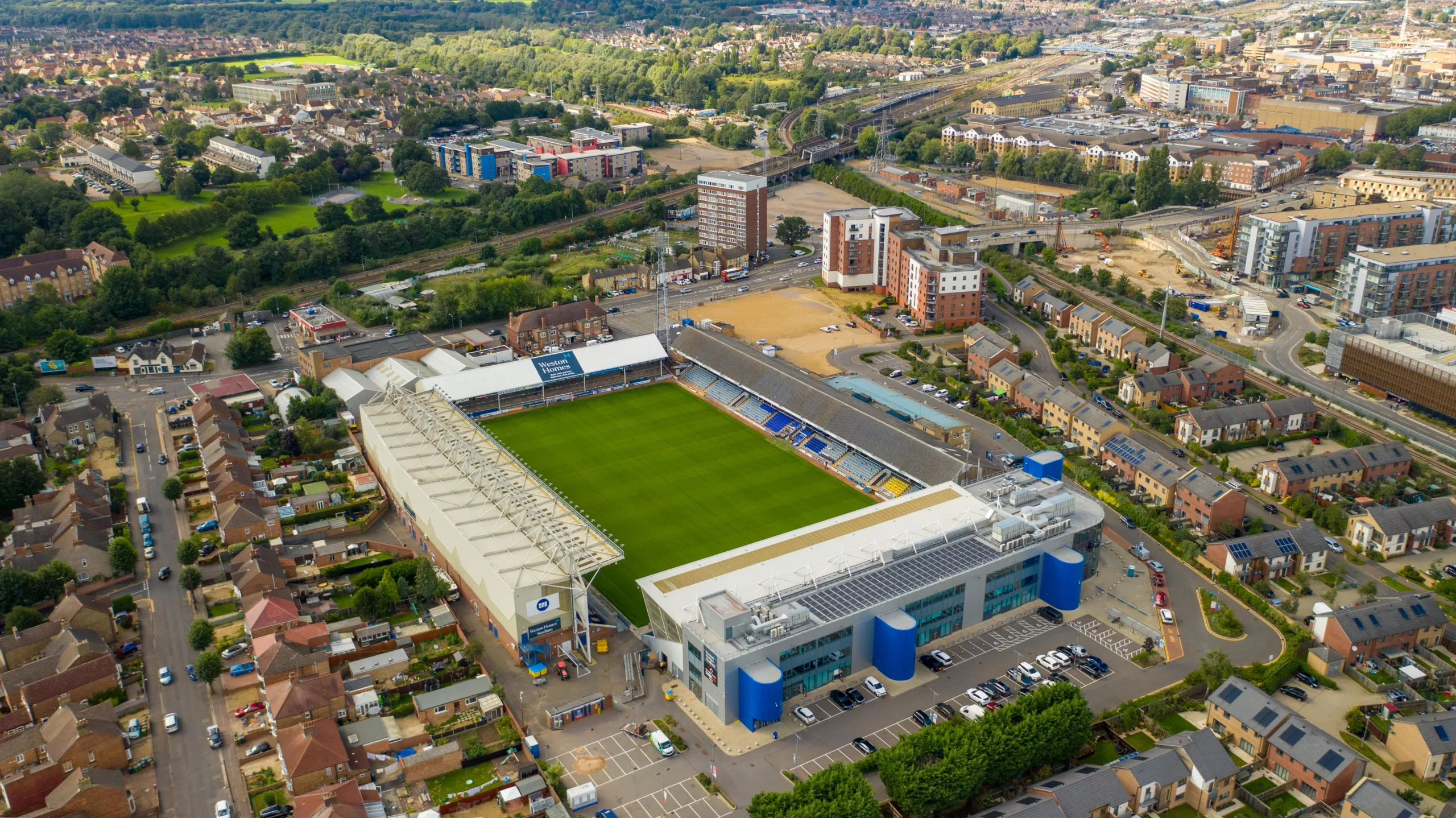 Three men have been banned from attending football matches following their involvement in disorder between fans at a game between Peterborough United and Cambridge United last year