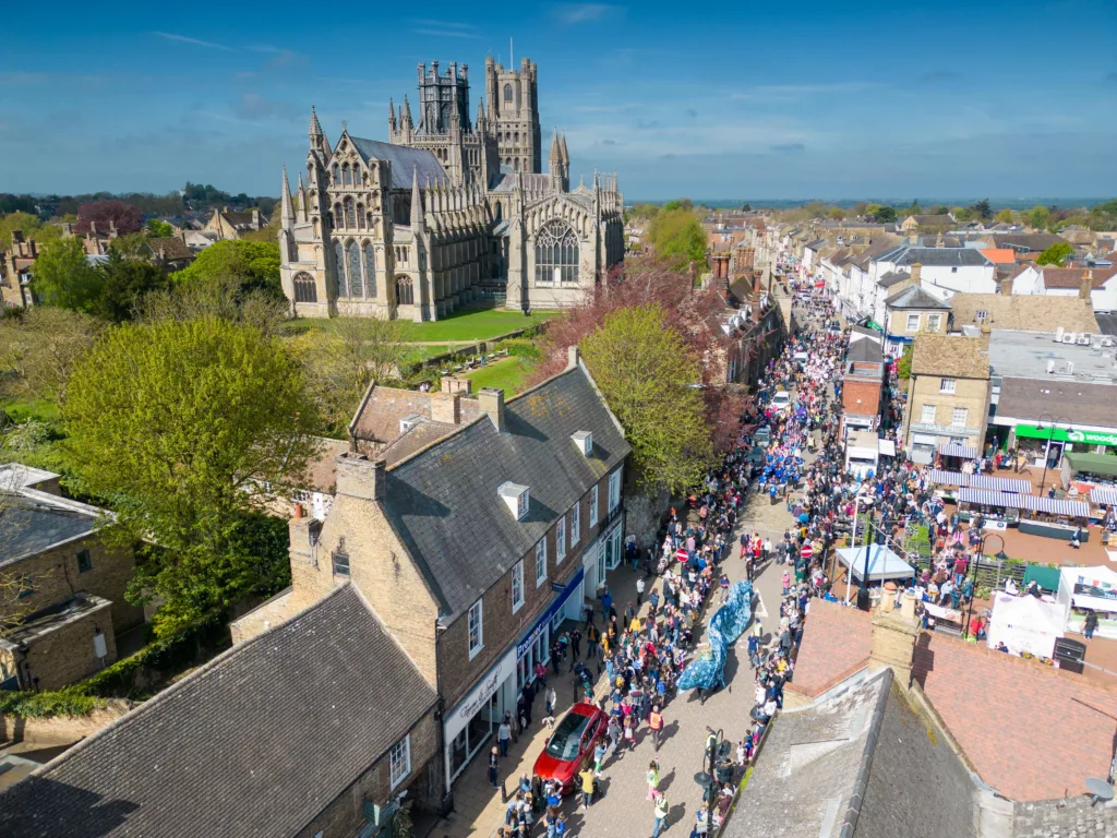 Dubbed ‘Coronation Eel Day’ the spectacular eel focal point snaked its way from Cross Green through the streets to Jubilee Gardens to begin a packed day of events by the river. Picture: TERRY HARRIS 