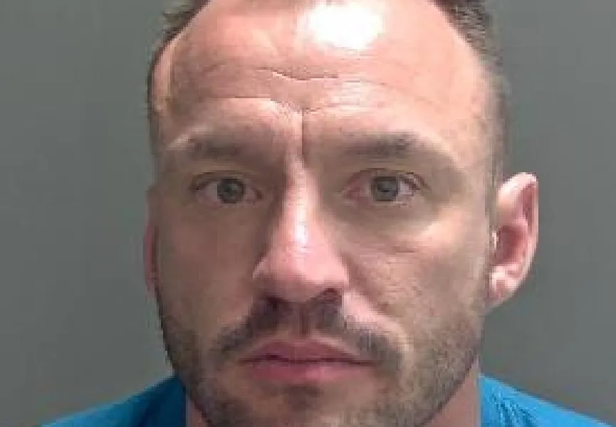 Daniel Holyoak, 39, punched the victim numerous times, stamped all over her body, dragged her around by her hair and repeatedly slammed a door into her