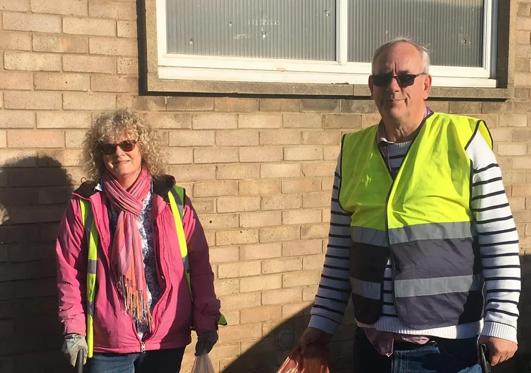 Cllr Dave Patrick with Ruth Freeman outside Walsoken Village Hall last year where they had undertaken a litter pick.