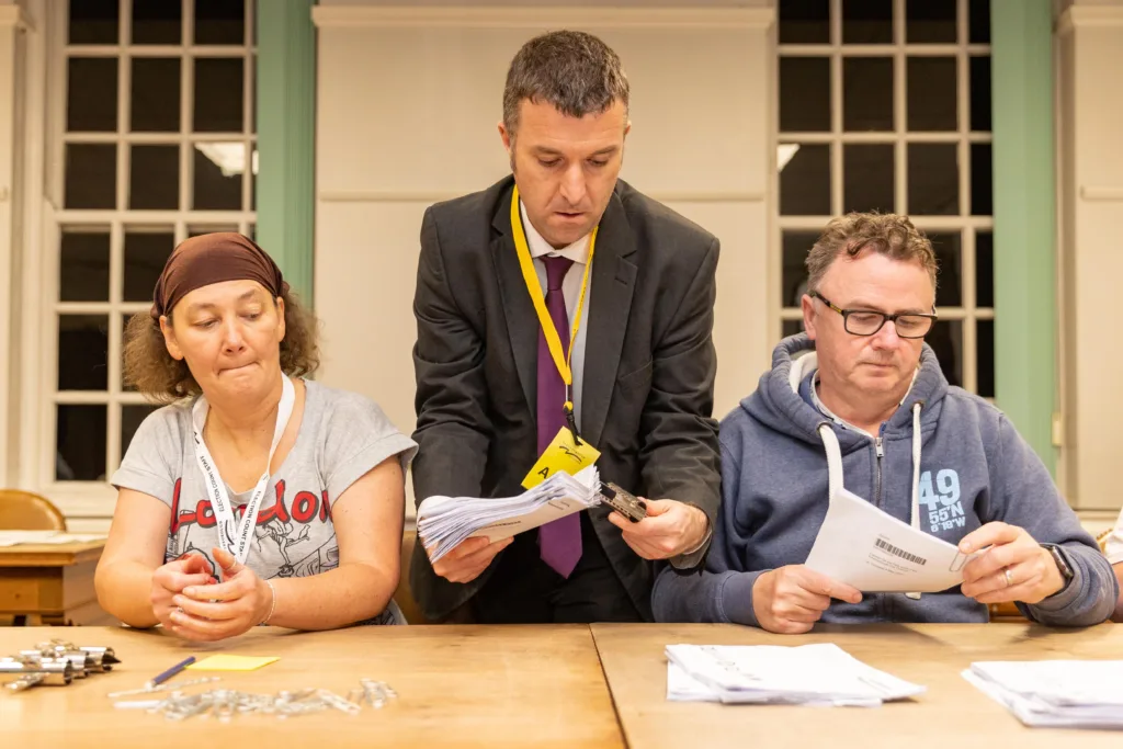 Ballot boxes are arriving, the votes sorted, and the count is under way in Peterborough