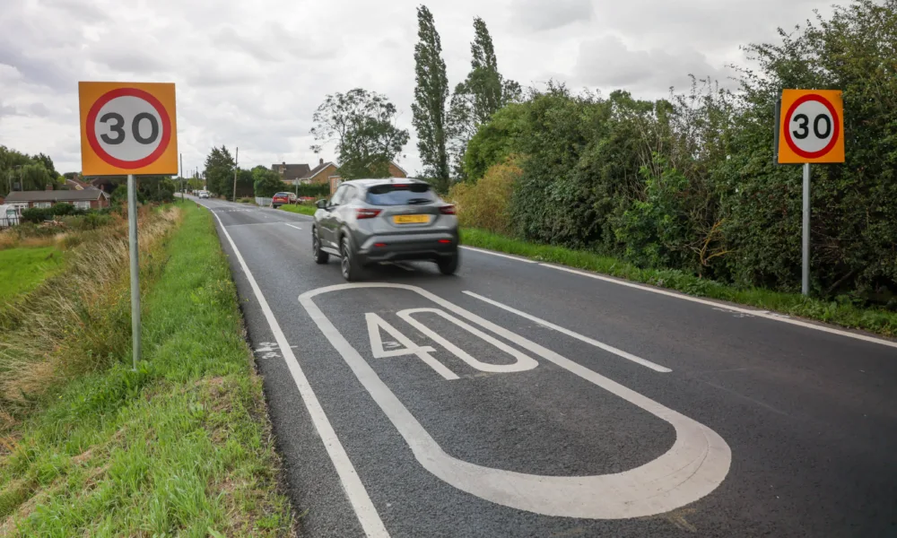 Which to choose: 30mph road signs or 40mph road marking? Drive into Murrow and you decide PHOTO: Terry Harris