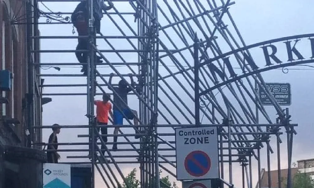 Photo doing the rounds of social media of youngsters using the scaffold at Cashino burnt out Wisbech store for climbing practice.