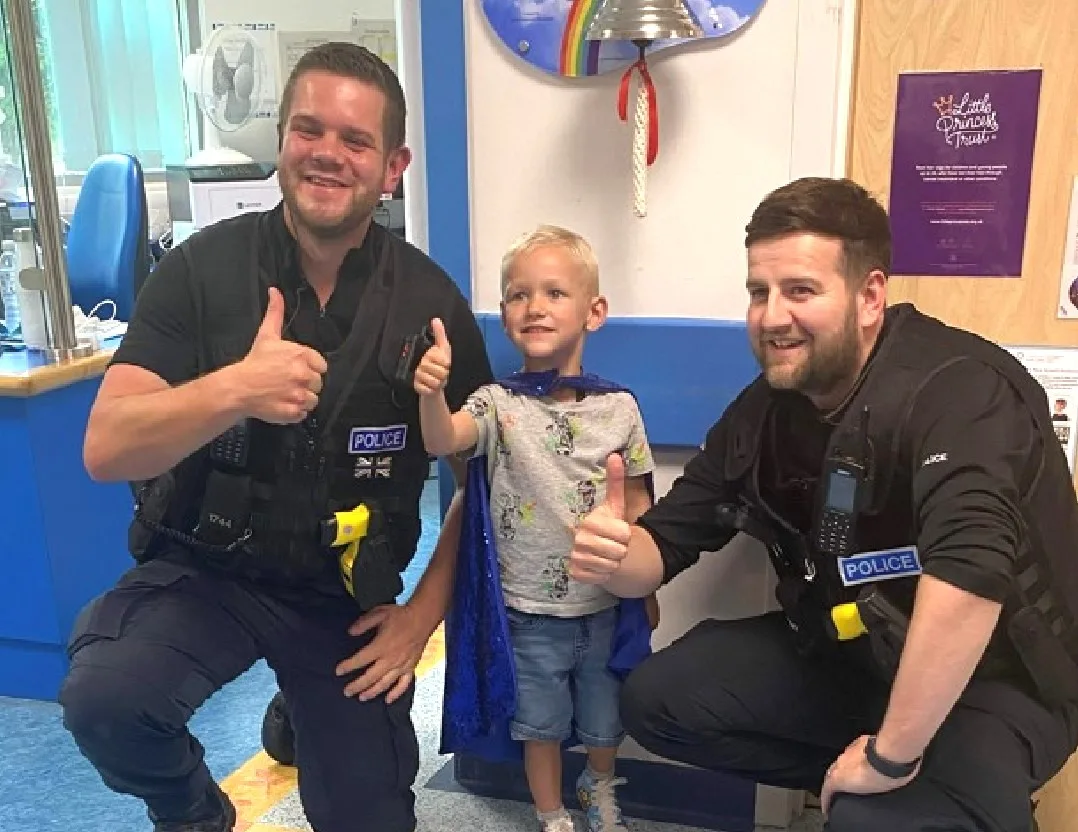 Police surprise Max as he is discharged from Addenbrooke’s Hospital after life saving treatment for cancer.