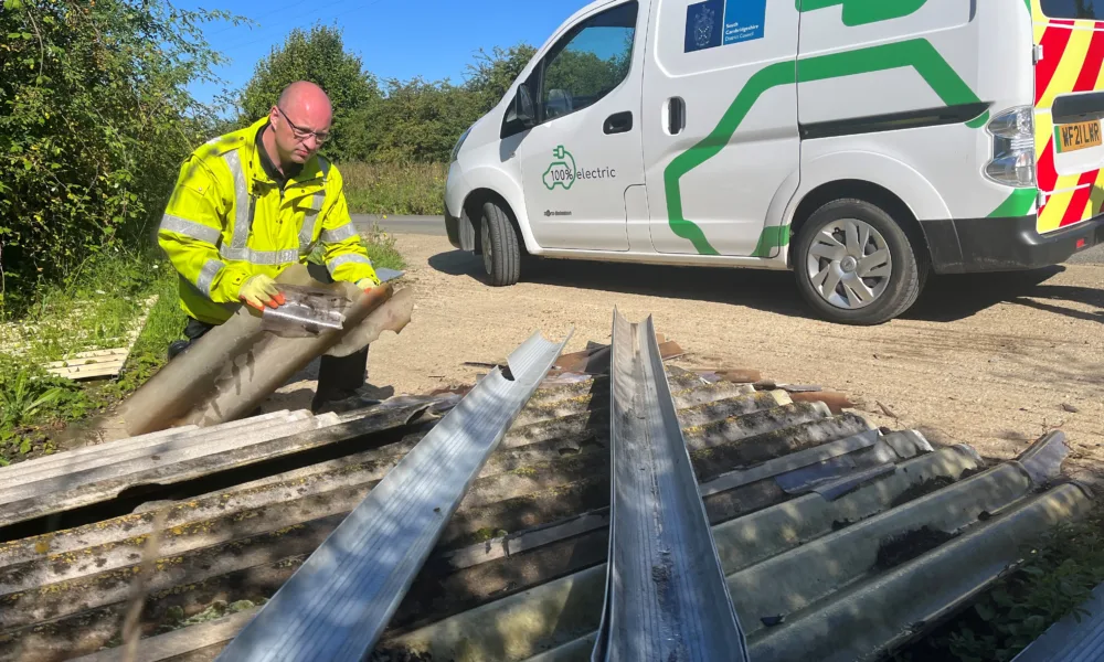 Enforcement officer Ben Wilkin at Caxton Gibbet tackling fly tipping issues in South Cambridgeshire