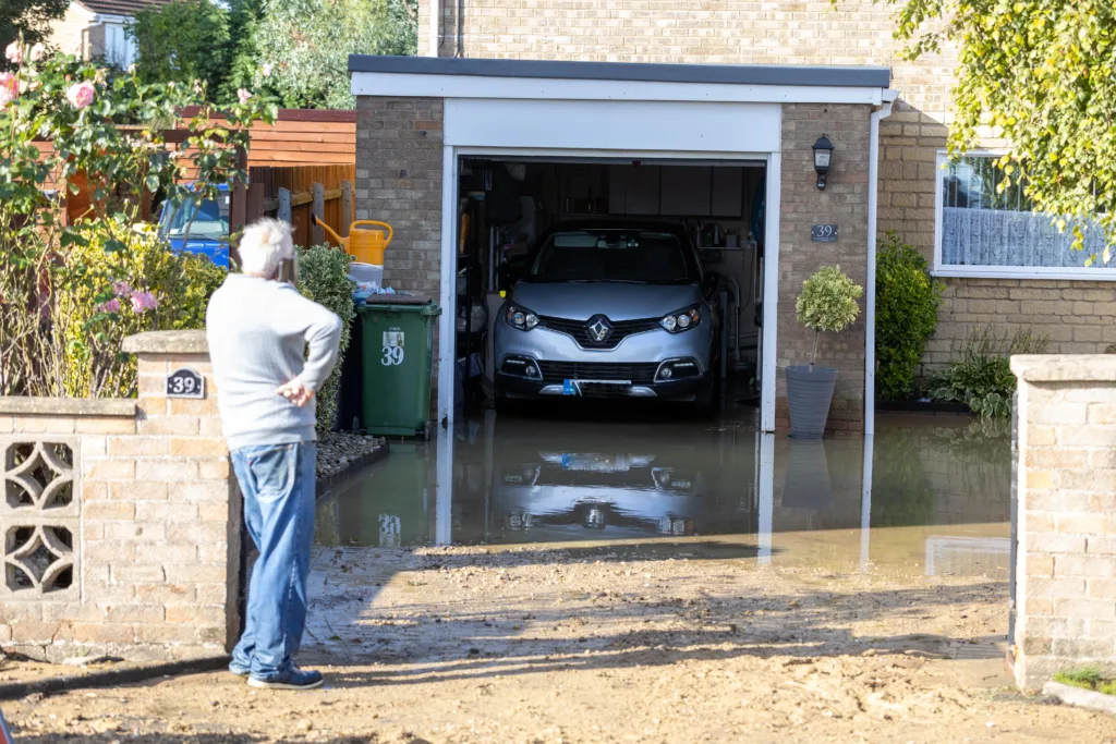 Peterborough Road, Farcet, where Anglian Water has been busy repairing a burst water main. Photo: Terry Harris 