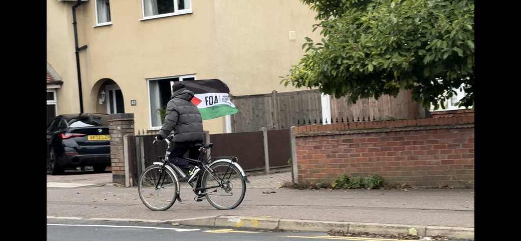 WATCH: Pro-Palestine cyclist takes to the streets of Peterborough to show support 