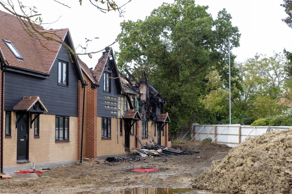 Police are working closely with fire service investigators after fire destroyed two new homes in St Ives in an arson attack. PHOTO: Terry Harris