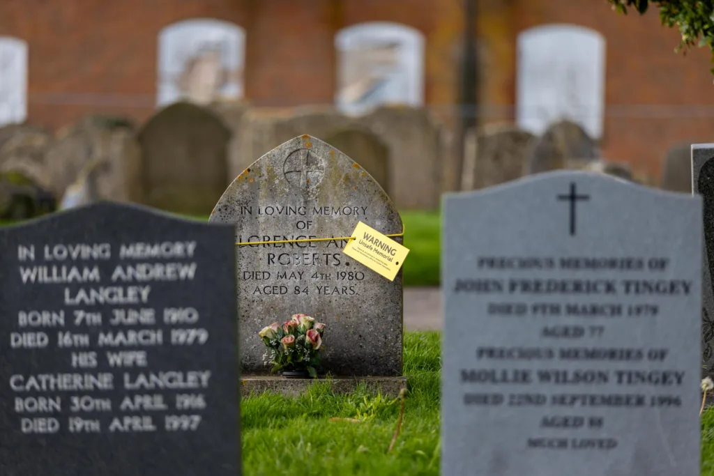 Residents in Terrington St Clement say health and safety has “gone mad” after their local council placed yellow warning tags on gravestones. PHOTO: Terry Harris