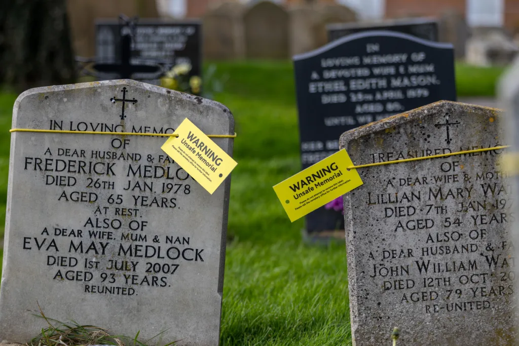 Residents in Terrington St Clement say health and safety has “gone mad” after their local council placed yellow warning tags on gravestones. PHOTO: Terry Harris