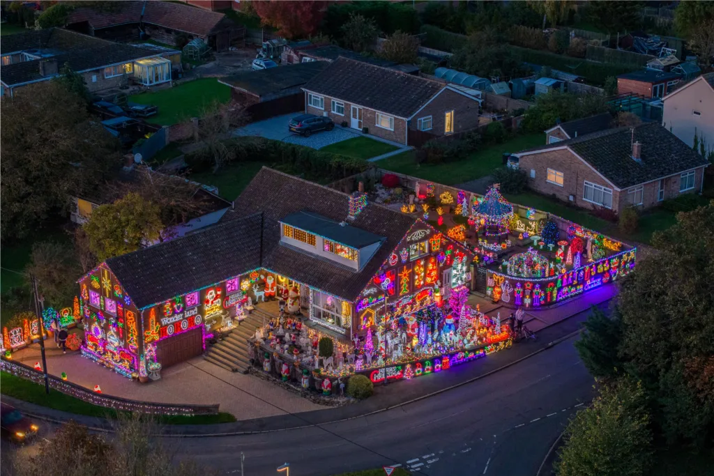 John and Helen Attesley have again turned their Soham home into a Christmas lights eye catcher: not long after the switch on, Soham Town Rangers held a fantastic fireworks display. PHOTO: Terry Harris for CambsNews 