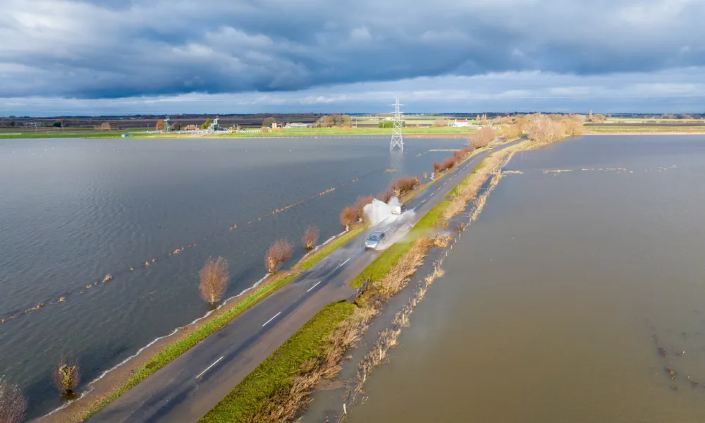 Road starts to flood as severe flood warning is issued for the B1040, B1040, Whittlesey Monday 11 December 2023. Picture by Terry Harris.