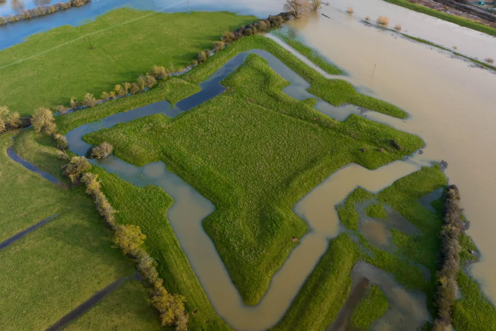 Flooding reveals English Civil War fort after Storm Henk. The clear outline of a 400-year-old English Civil War fort has been highlighted after heavy rain and flooding filled a moat around the earthworks following Storm Henk. Aerial photos show The Earith Bulwark in the Cambridgeshire Fens, which was built around 1643 by Oliver Cromwell's forces to protect crossing points on the local rivers, including the River Great Ouse. Picture by Terry Harris.