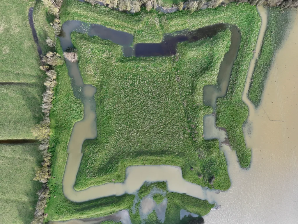 Flooding reveals English Civil War fort after Storm Henk. The clear outline of a 400-year-old English Civil War fort has been highlighted after heavy rain and flooding filled a moat around the earthworks following Storm Henk. Aerial photos show The Earith Bulwark in the Cambridgeshire Fens, which was built around 1643 by Oliver Cromwell's forces to protect crossing points on the local rivers, including the River Great Ouse. Picture by Terry Harris.