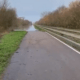 Photos from Cambridgeshire County Council show the maintenance track of the guided busway flooded between Swavesey and St Ives