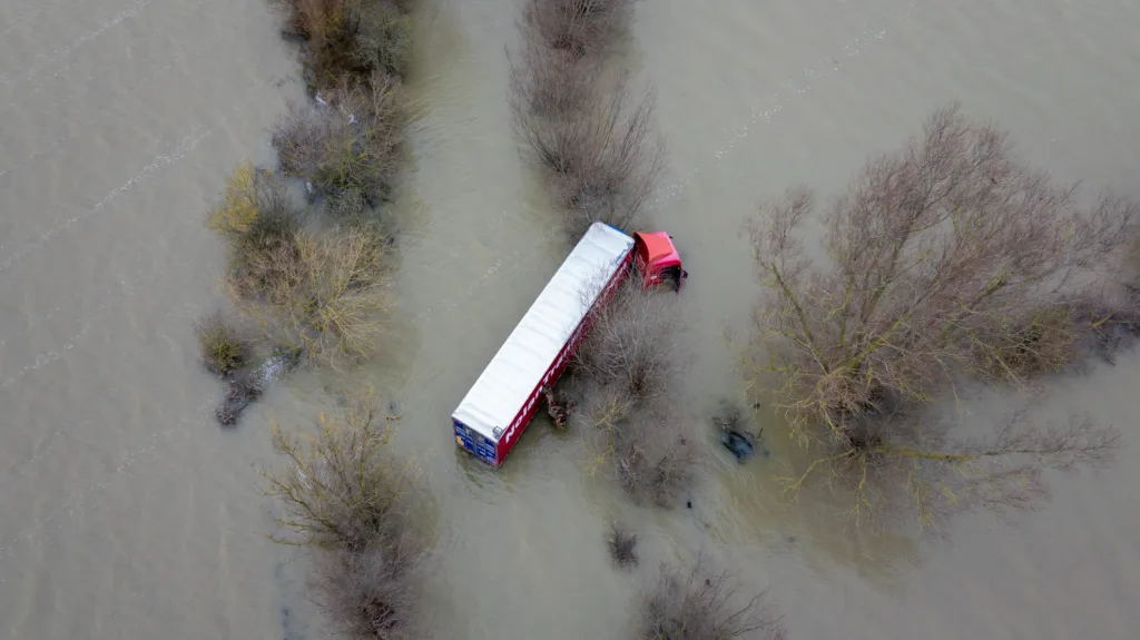 Well and truly stuck: The truck and trailer owned by Nolan Transport that attempted an unsuccessful crossing of Welney Wash road today. PHOTO: Bav Media 