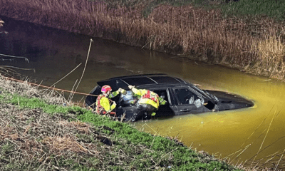 Emergency workers establish the car in the river at Prickwillow had no occupants