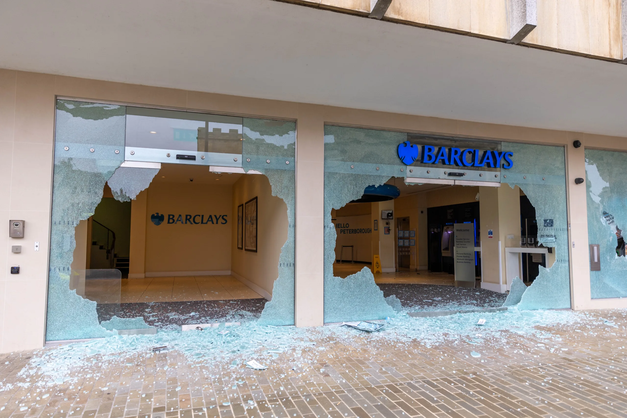 Glass counters have been damaged, three main windows broken, and two external wall mounted ATM machines have been damaged during a break in today at Barclays Bank, Peterborough City Centre. PHOTO: Terry Harris