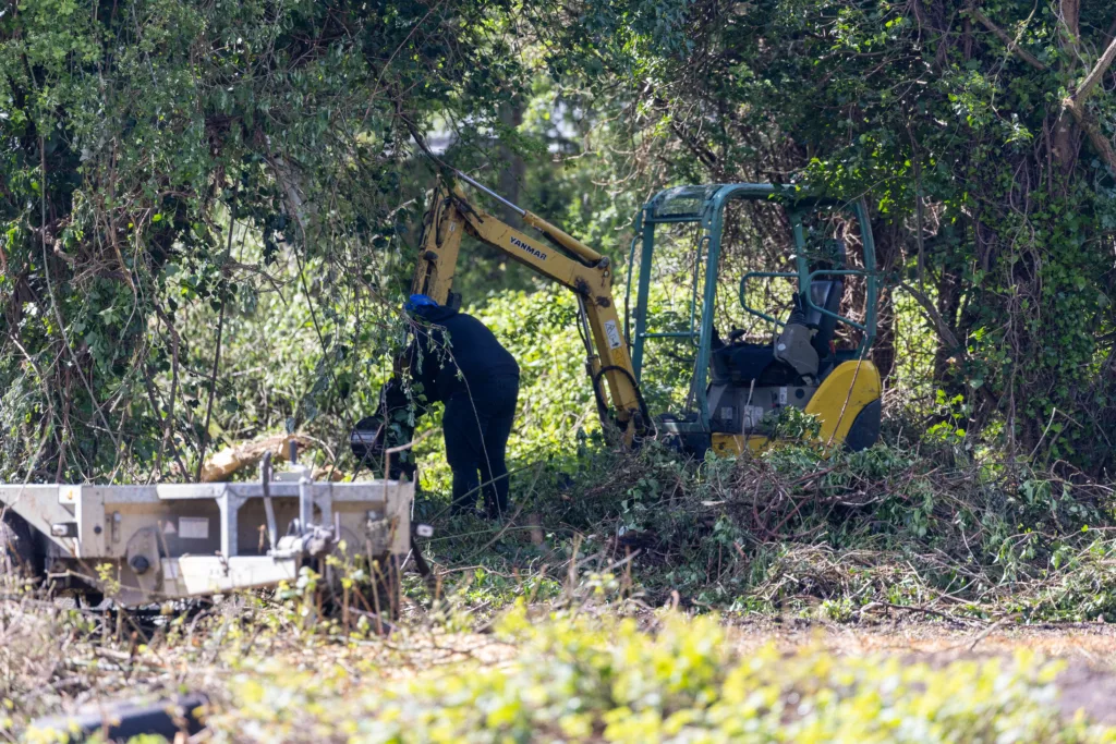 The site off Gunthorpe Road where workmen have begun clearing the site and caused an uproar among local residents. Residents have taken photos of the area being cleared and contacted councillors for an explanation. Above: police visit today