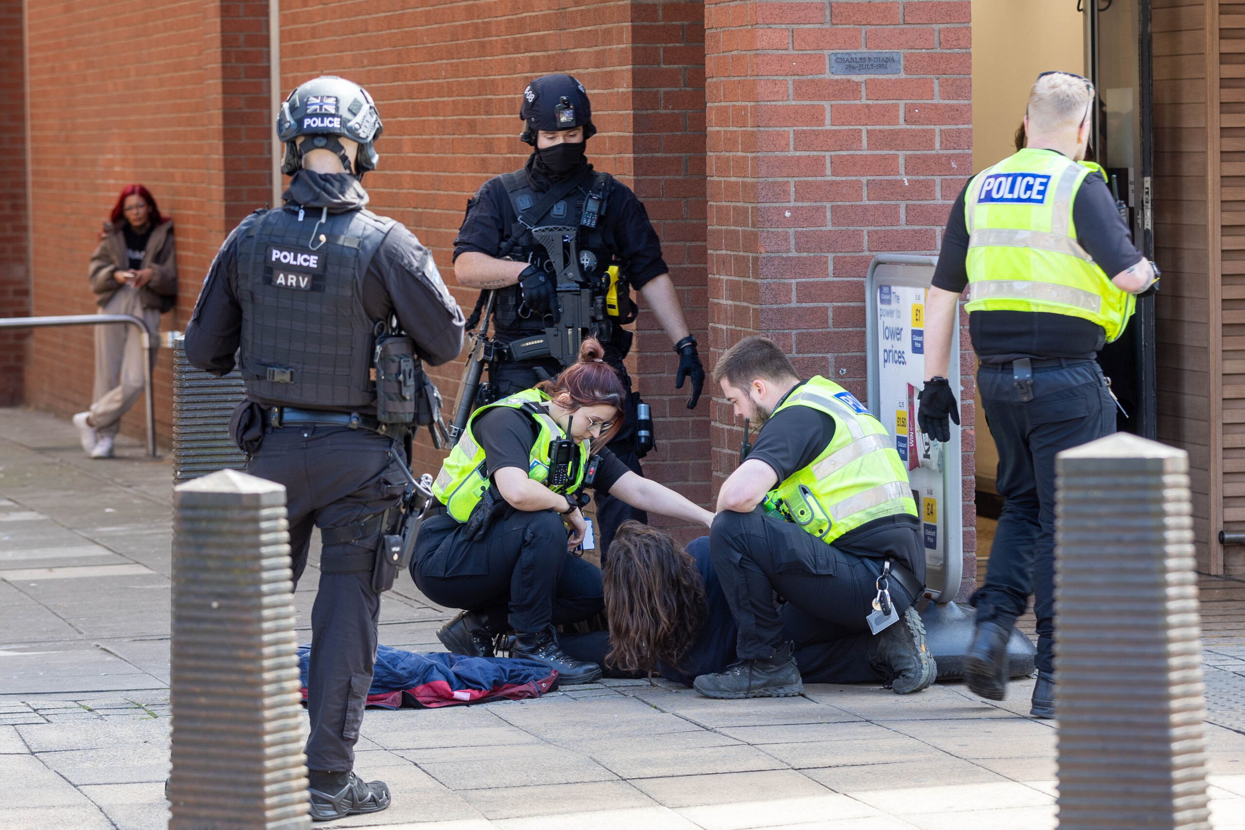 Armed police out in Peterborough today and gave chase prior to arrest in Broadway. PHOTO: Terry Harris