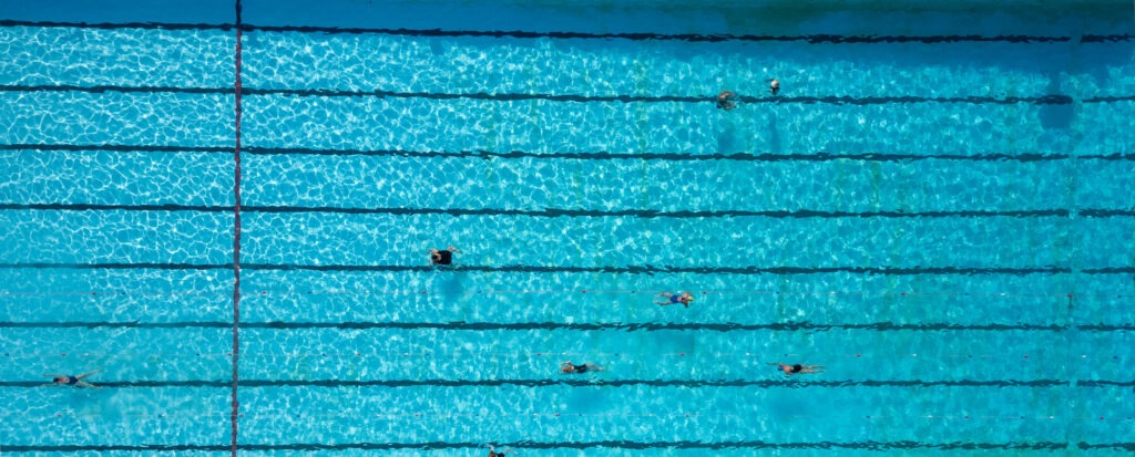 Swimmers in Peterborough take advantage of the heat and dive into The Lido pool. Friday 19 July 2024. PHOTO: Terry Harris 