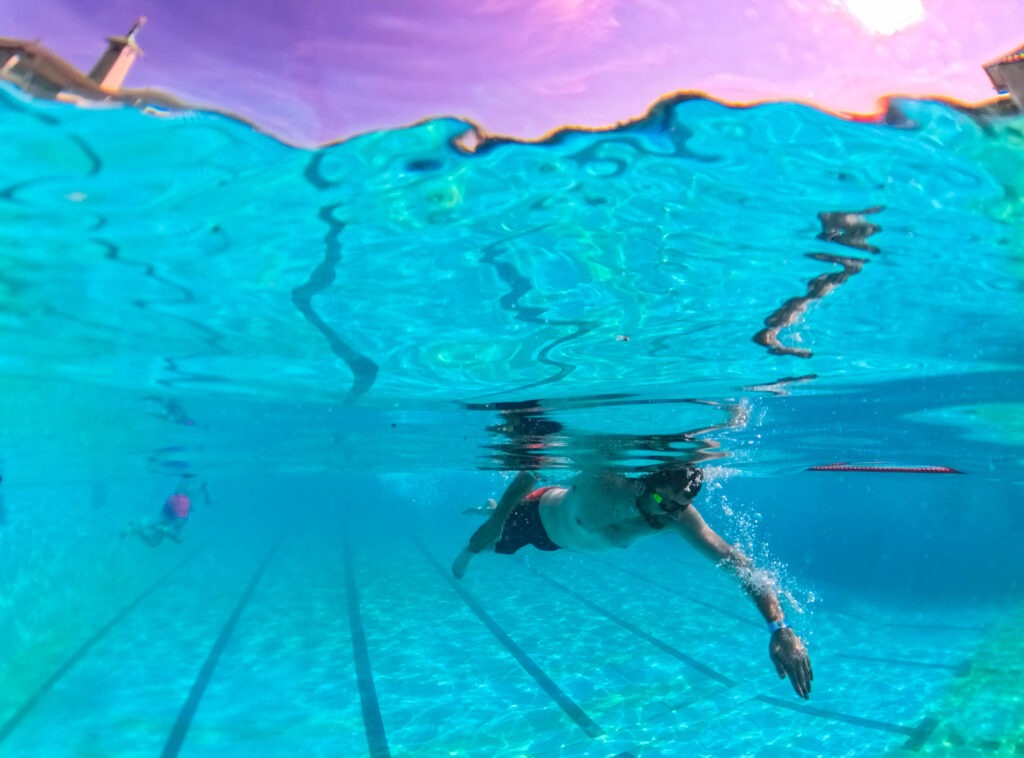 Swimmers in Peterborough take advantage of the heat and dive into The Lido pool. Friday 19 July 2024. PHOTO: Terry Harris 