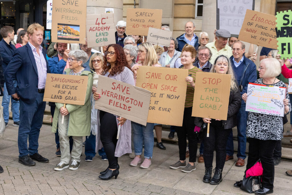 A public protest was staged ahead of a Cabinet meeting in Peterborough to decide on the fencing off of land to benefit Ken Stimpson Academy. Peterborough Tuesday 16 July 2024. Picture by Terry Harris.