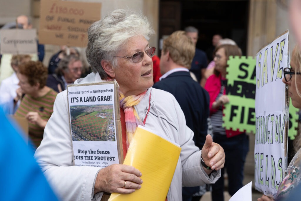 A public protest was staged ahead of a Cabinet meeting in Peterborough to decide on the fencing off of land to benefit Ken Stimpson Academy. Peterborough Tuesday 16 July 2024. Picture by Terry Harris.