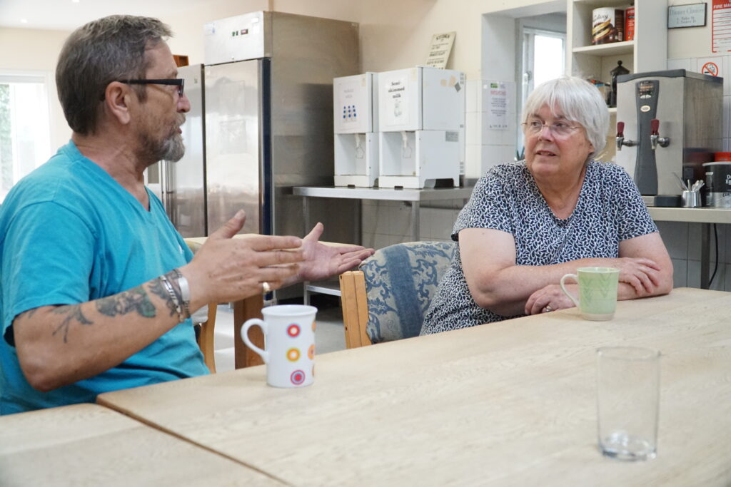 : Pledging support for supported housing – MP Charlotte talks with companion Rob about his experiences at Emmaus Cambridge.