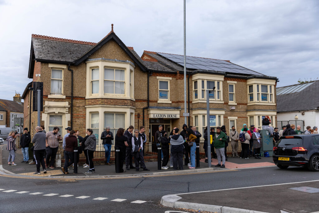 ‘Peterborough riots are so peaceful it’s just showing y’all what’s community spirit,’ wrote one man. Counter protestors congregate on Lincoln Road following social media threats to burn a local immigration centre. Millfield, Peterborough Wednesday 07 August 2024. PHOTO: Terry Harris.