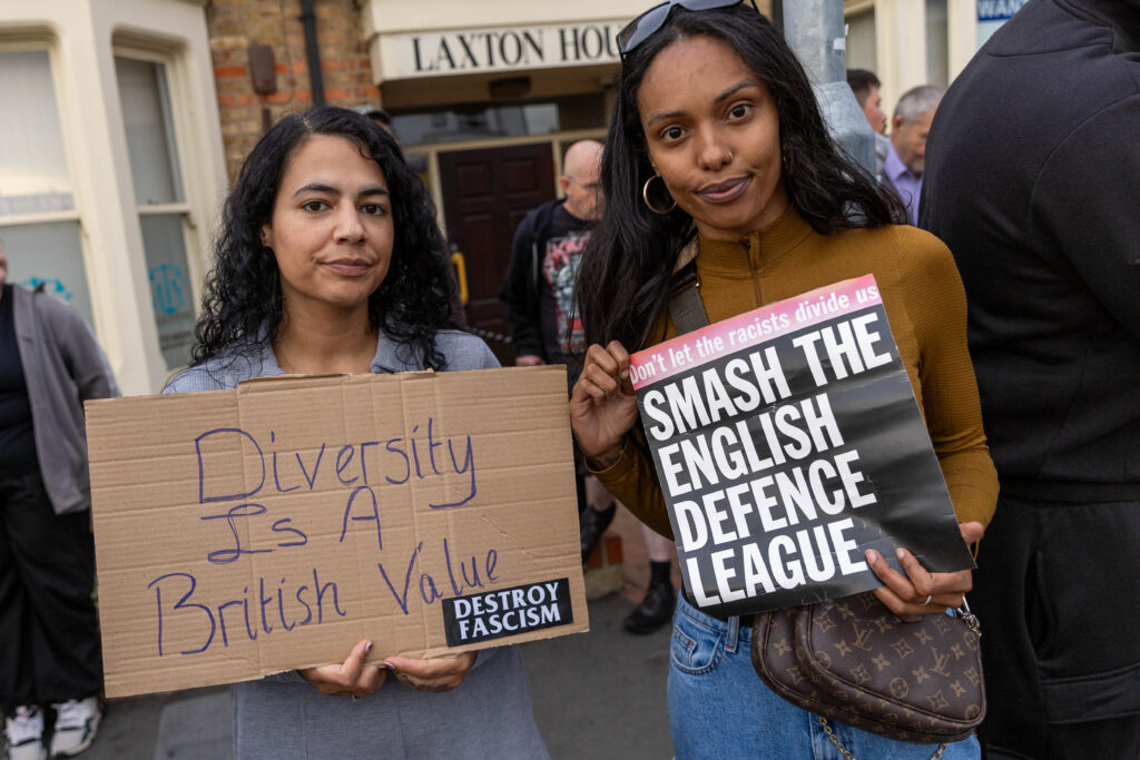 ‘Peterborough riots are so peaceful it’s just showing y’all what’s community spirit,’ wrote one man. Counter protestors congregate on Lincoln Road following social media threats to burn a local immigration centre. Millfield, Peterborough Wednesday 07 August 2024. PHOTO: Terry Harris.