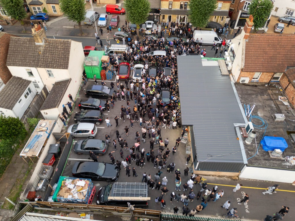 ‘Peterborough riots are so peaceful it’s just showing y’all what’s community spirit,’ wrote one man. Counter protestors congregate on Lincoln Road following social media threats to burn a local immigration centre. Millfield, Peterborough Wednesday 07 August 2024. PHOTO: Terry Harris.